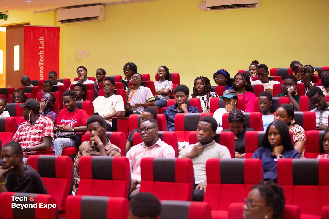 From the 2025 Expo: a full lecture hall of attendees listening