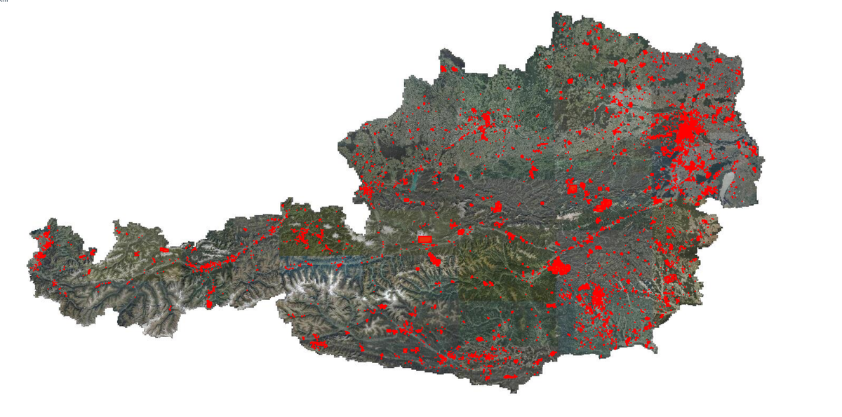 eine Satelitenansicht von Österreich mit rot markierten Grundstücken