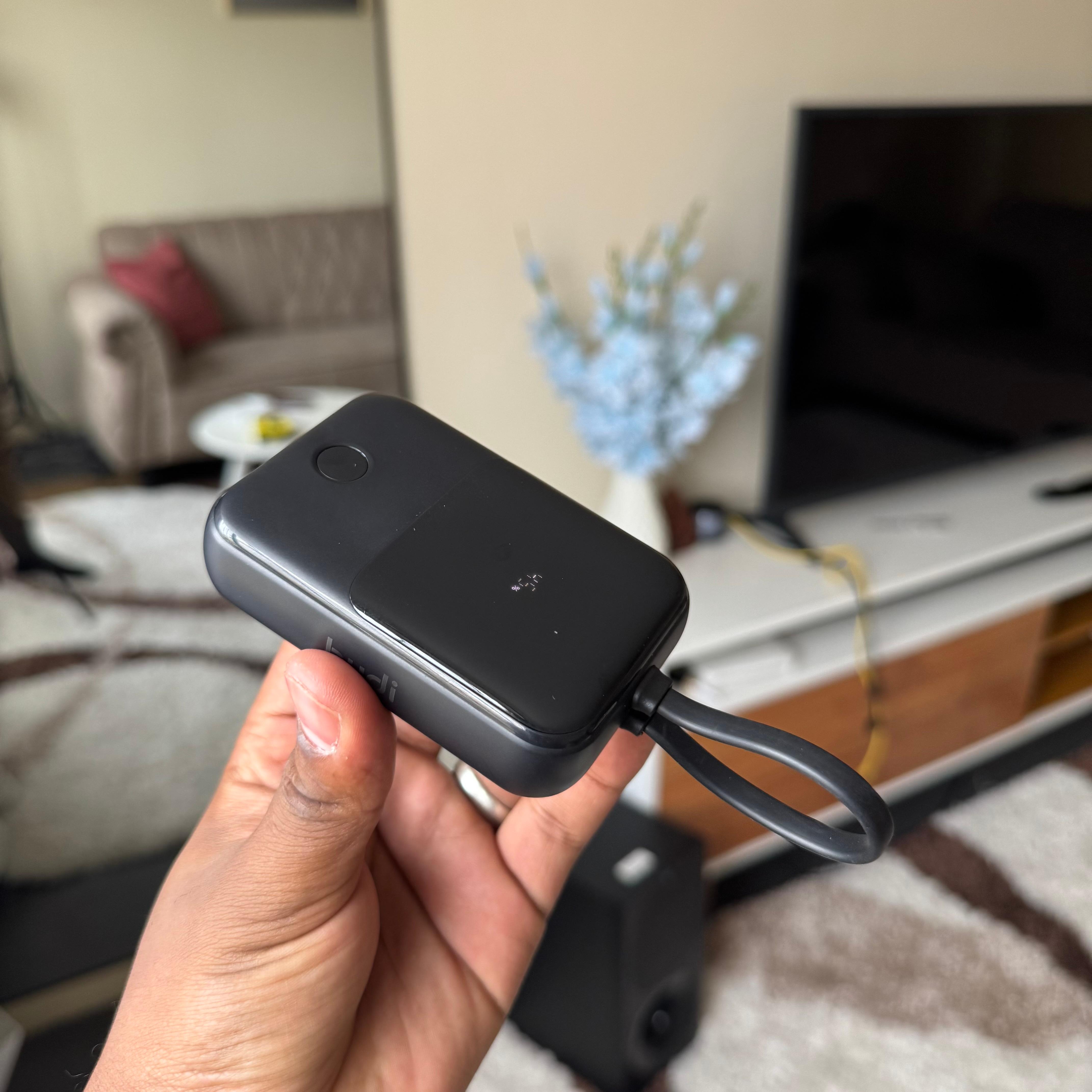 Budi 10000mAh portable powerbank with attached multifunctional cable image 2