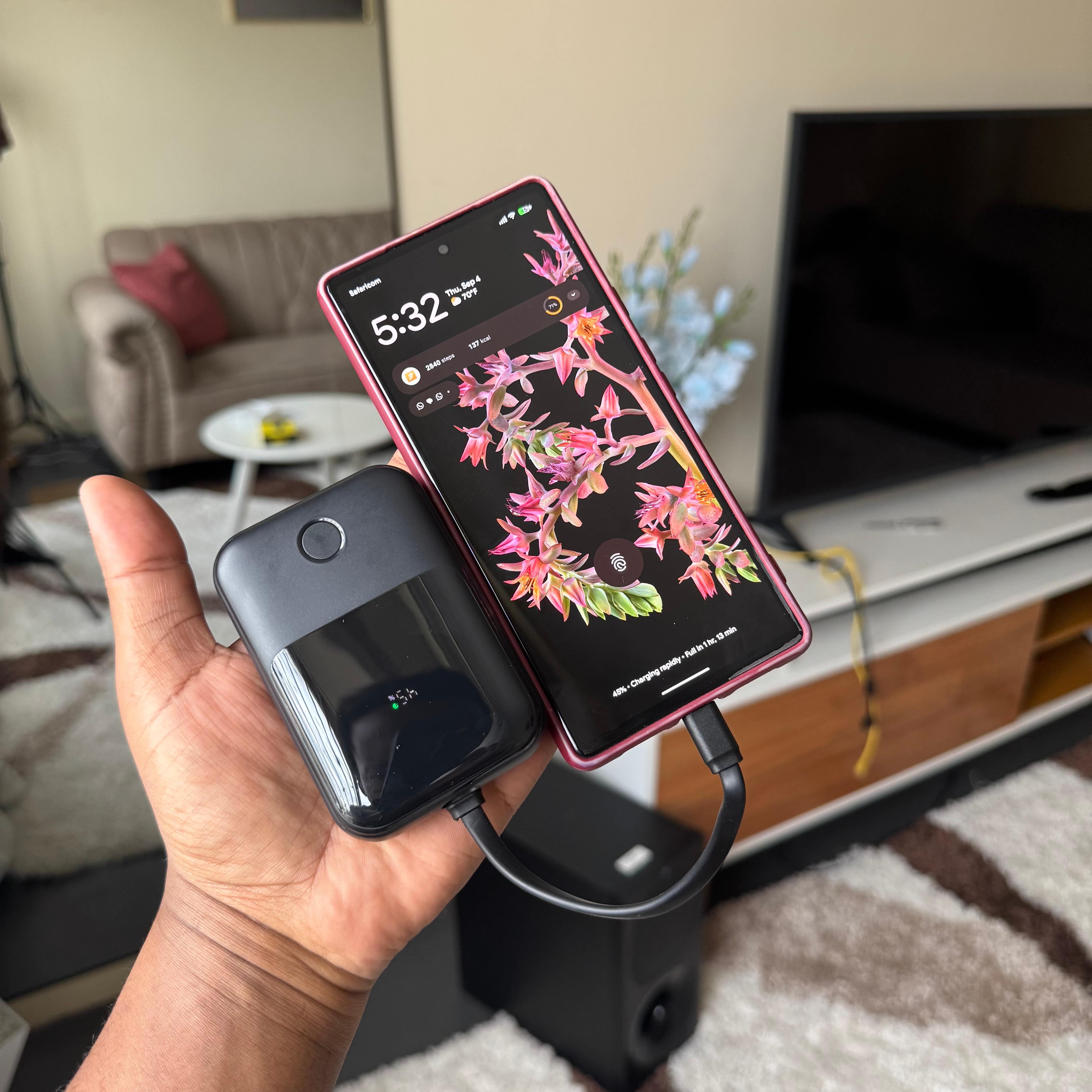 Budi 10000mAh portable powerbank with attached multifunctional cable image 3