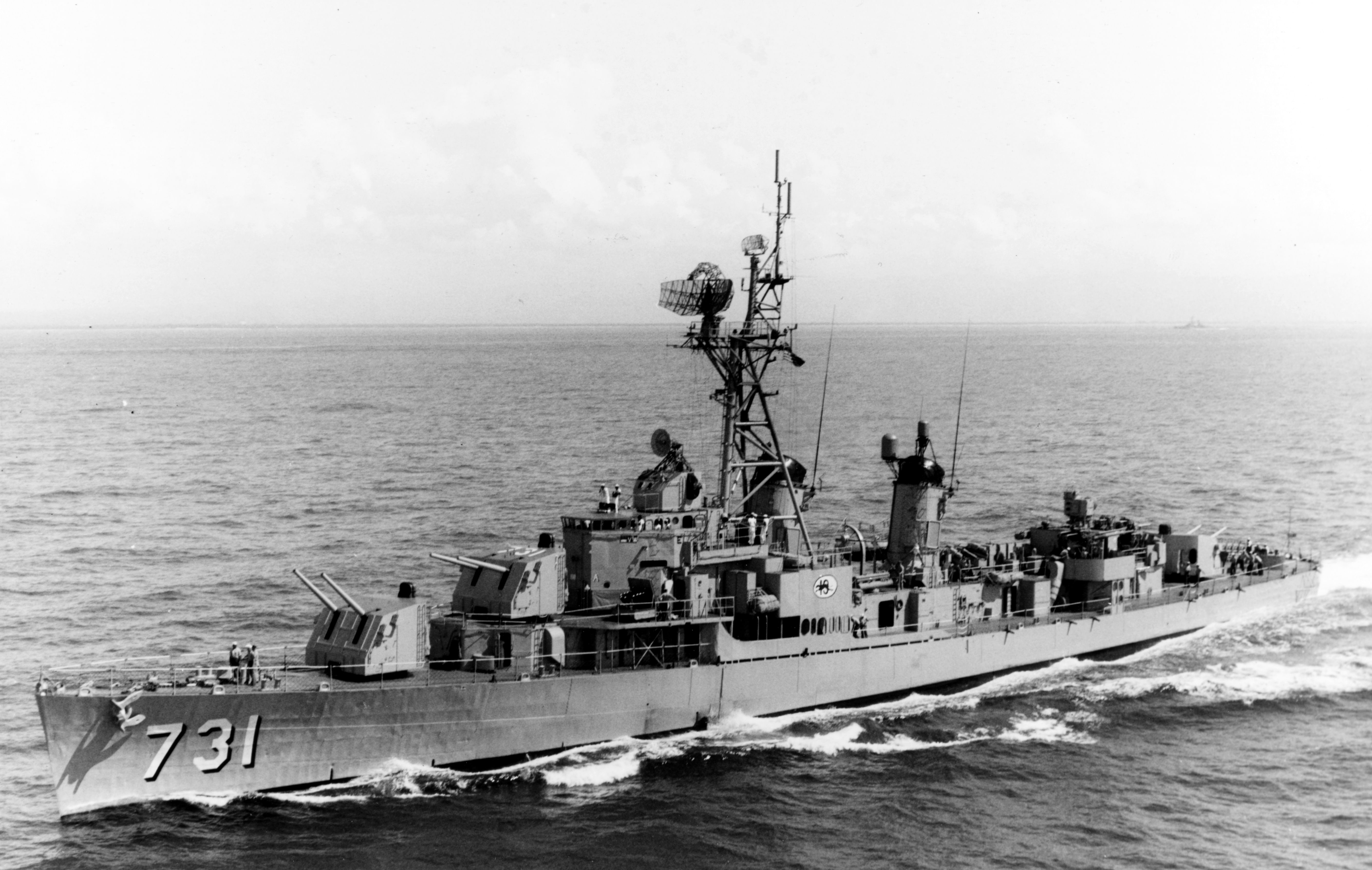 USS Maddox (DD-731) port bow view, photographed in 1964