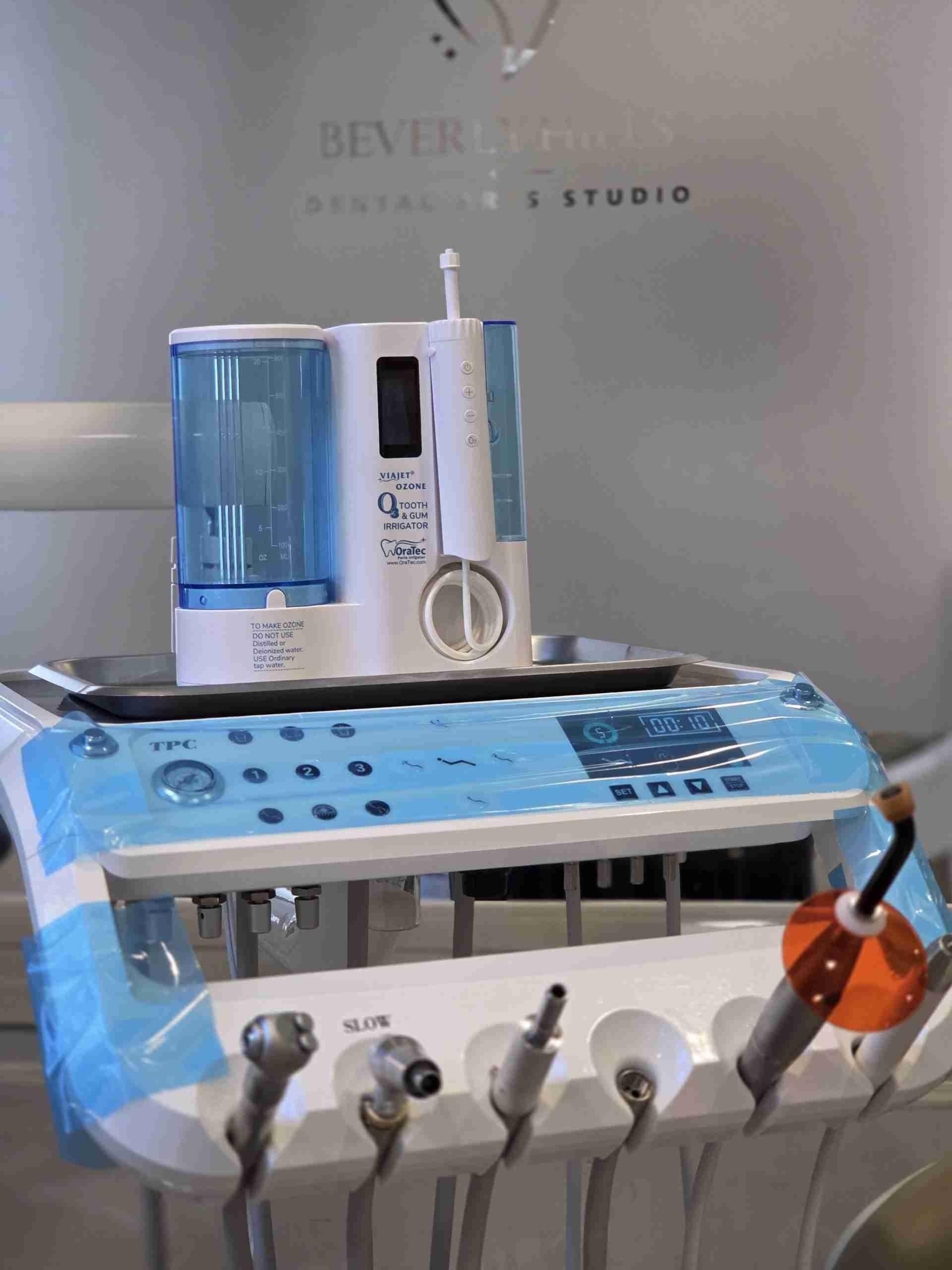 Ozone tooth and gum irrigator on the treatment tray