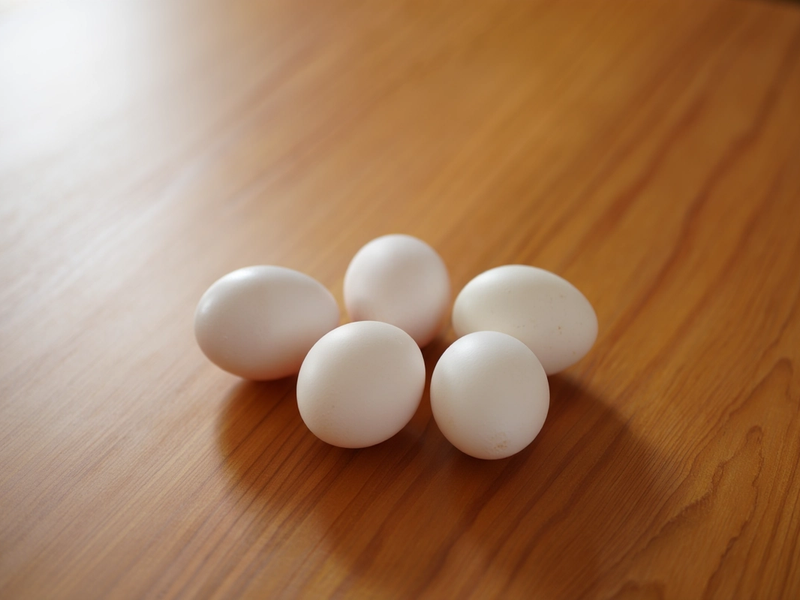 Bibinii farms eggs on a table