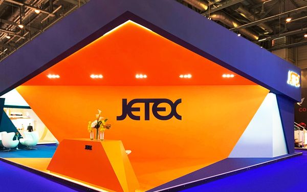 Exhibition stand with a dramatic lit entrance, photographed before the doors opened