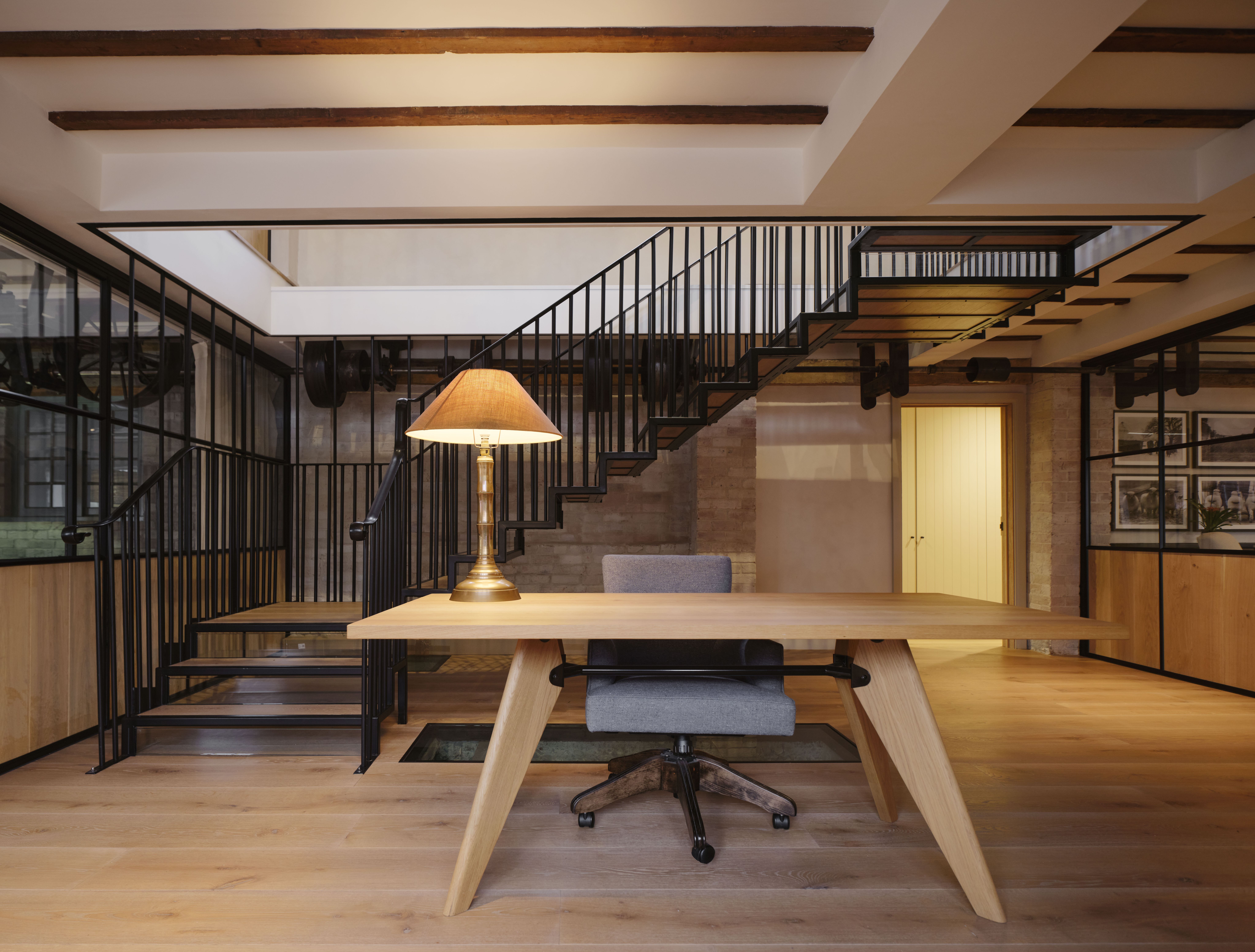 Reception area with new light-weight black metal staircase 