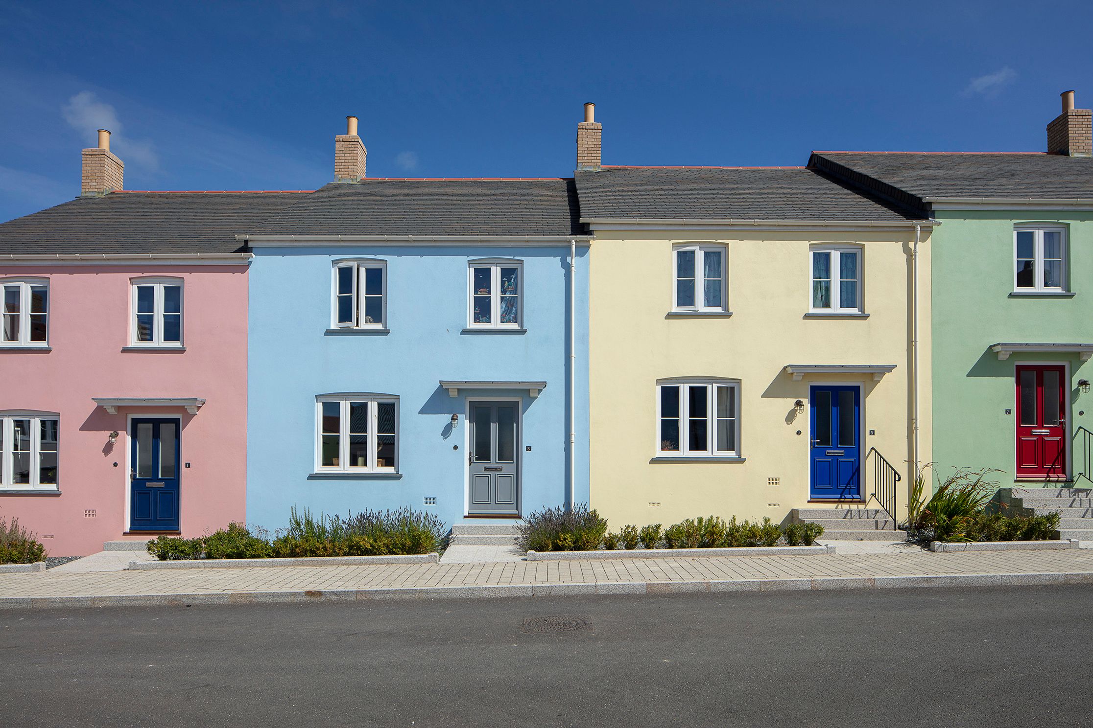 Row of Nansledan painted houses 