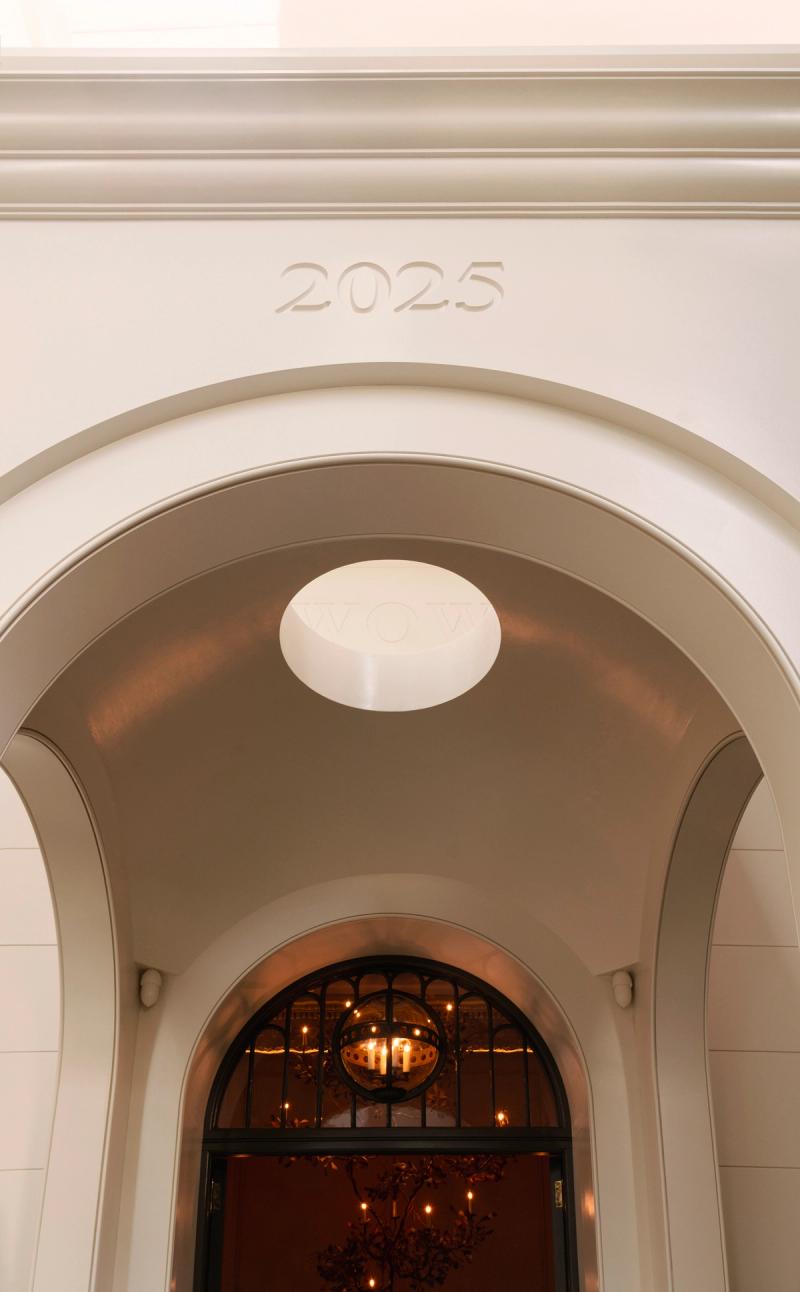 A photo of of the front vaulted portico on the facade, showing an oculus window at the centre