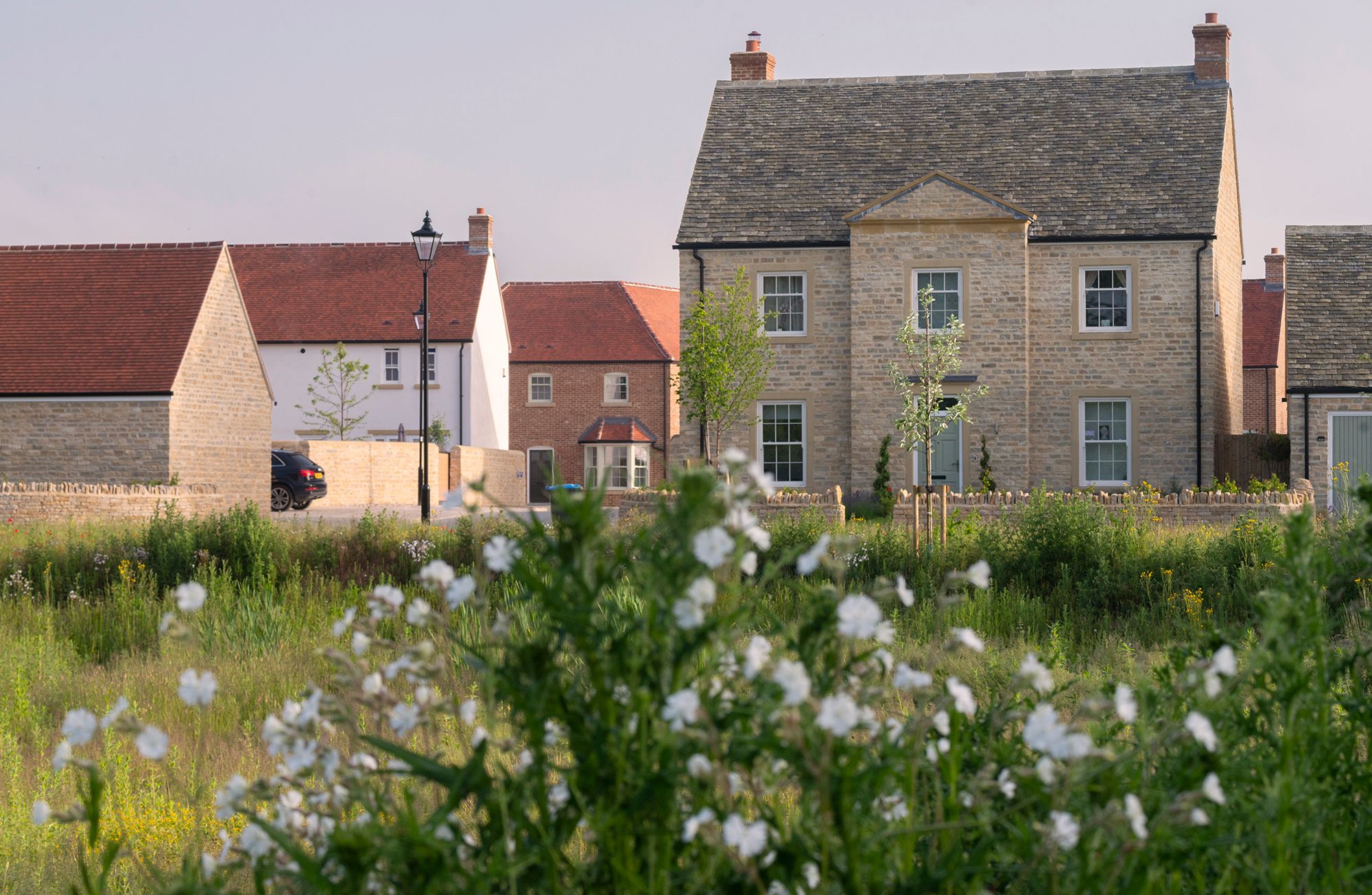 New home and green space within Park View, a masterplan for an urban extension in Woodstock, Oxfordshire