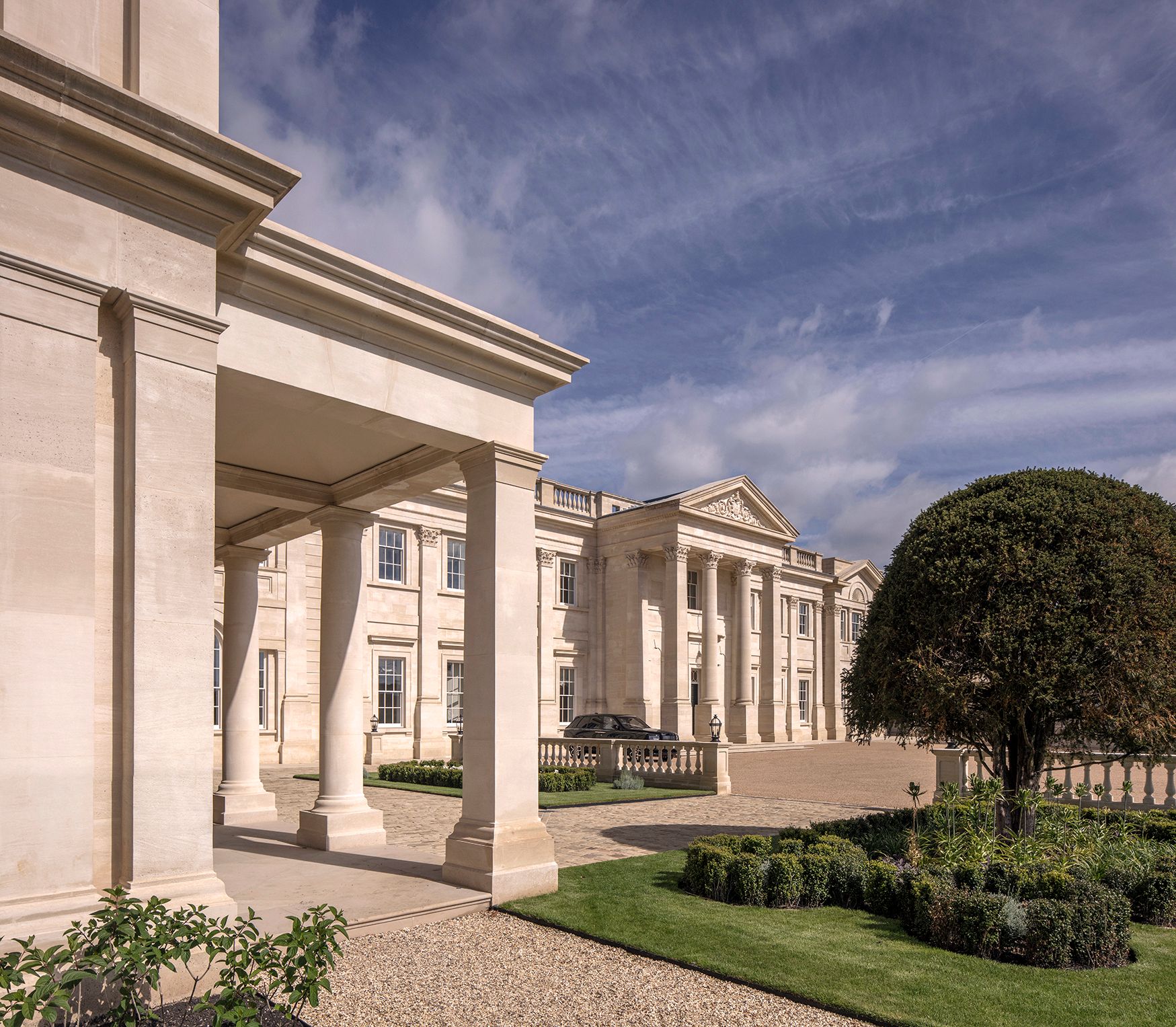 Exterior of the front elevation of the mansion house constructed from natural stone 
