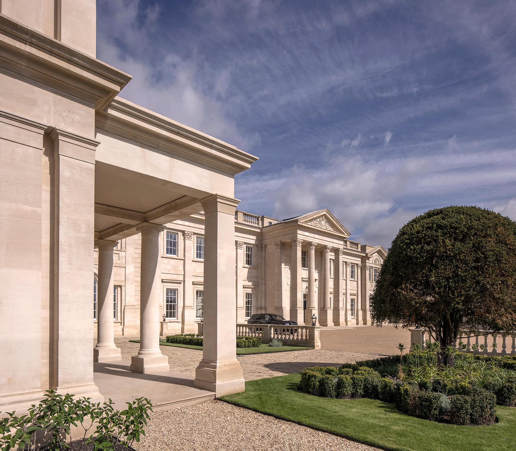 Exterior of the front elevation of the mansion house constructed from natural stone