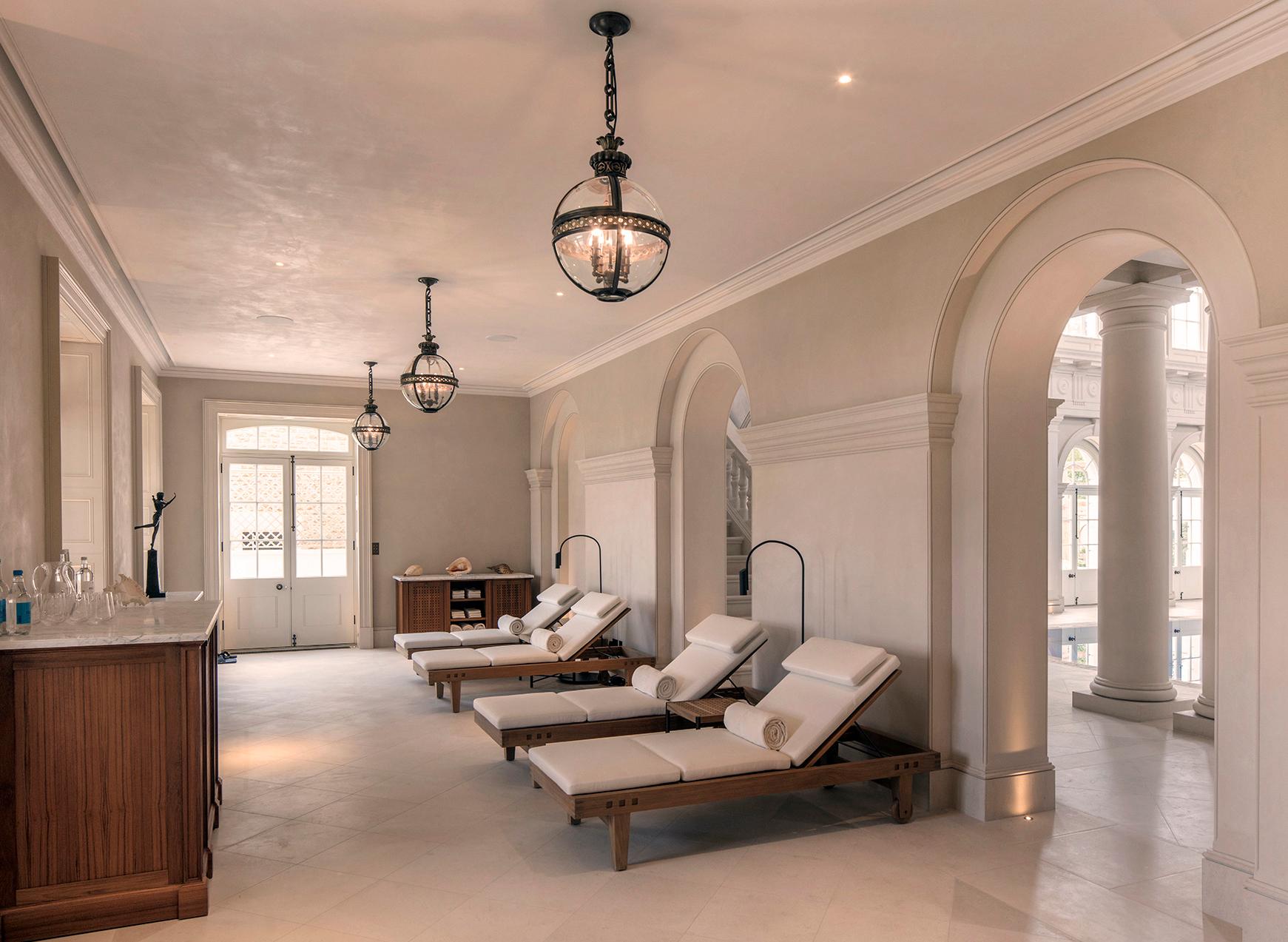 Pool hall interior, relaxing area to the side with day beds