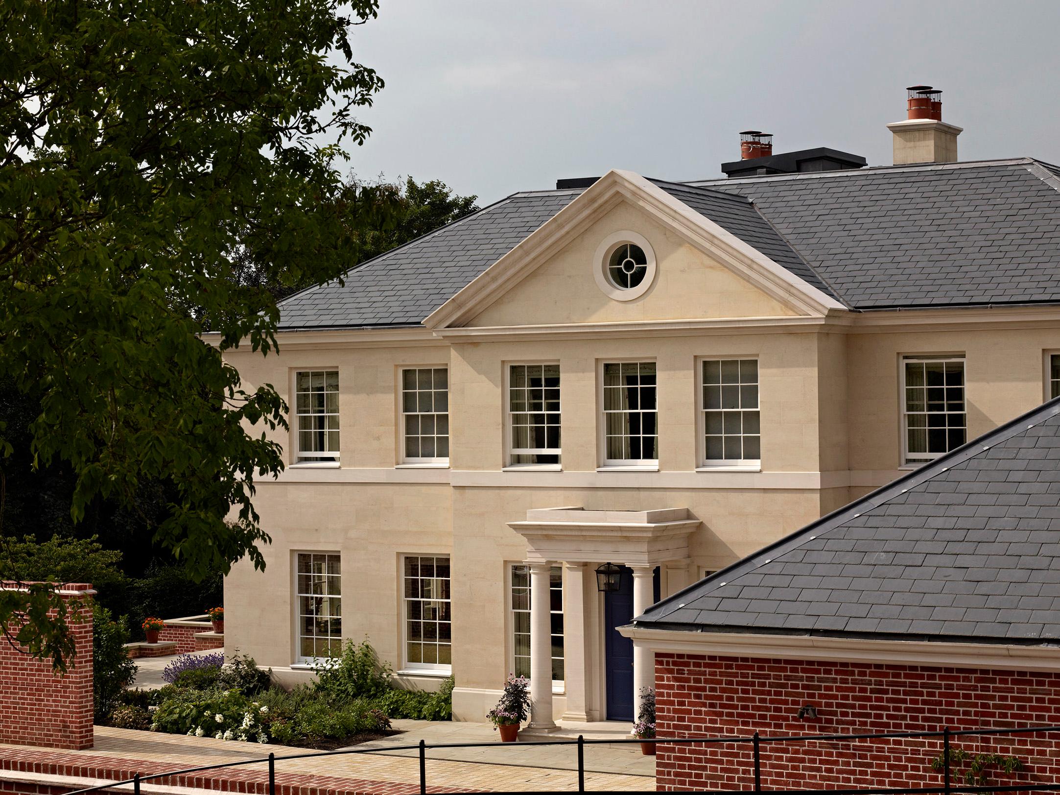 Entrance court with retaining brick wall