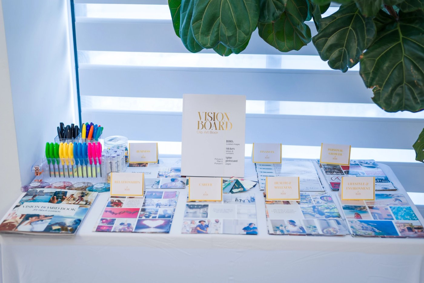 ALIGN Club vision board materials on a workshop table