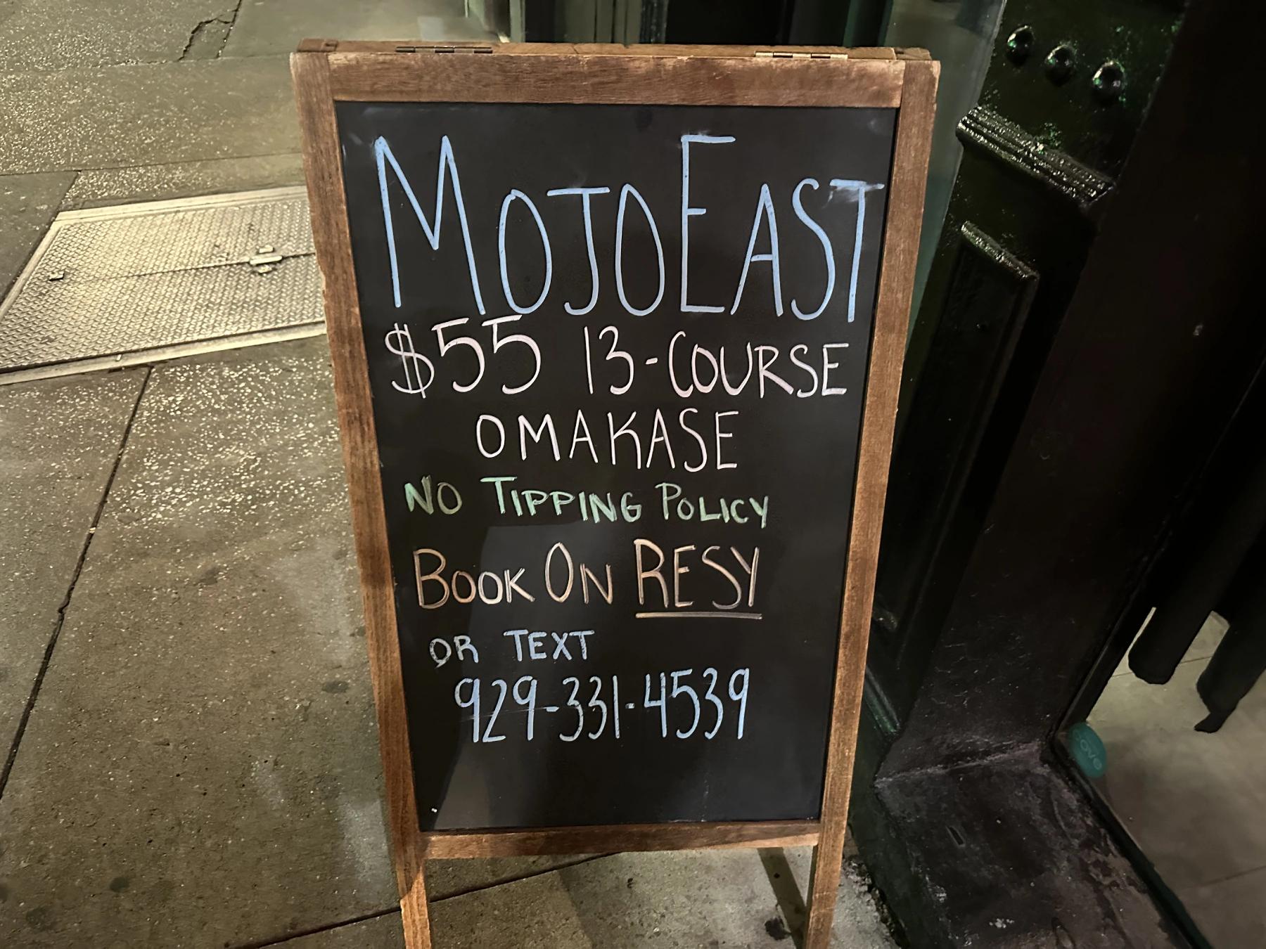 Mojo east sign, no tip policy