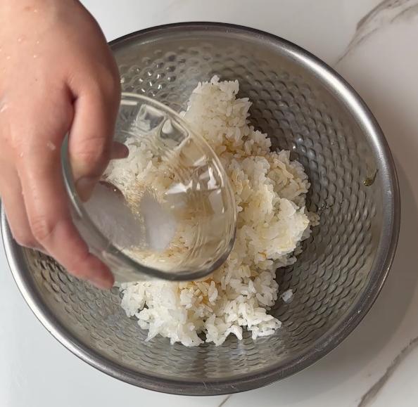 add salt on the steamed rice