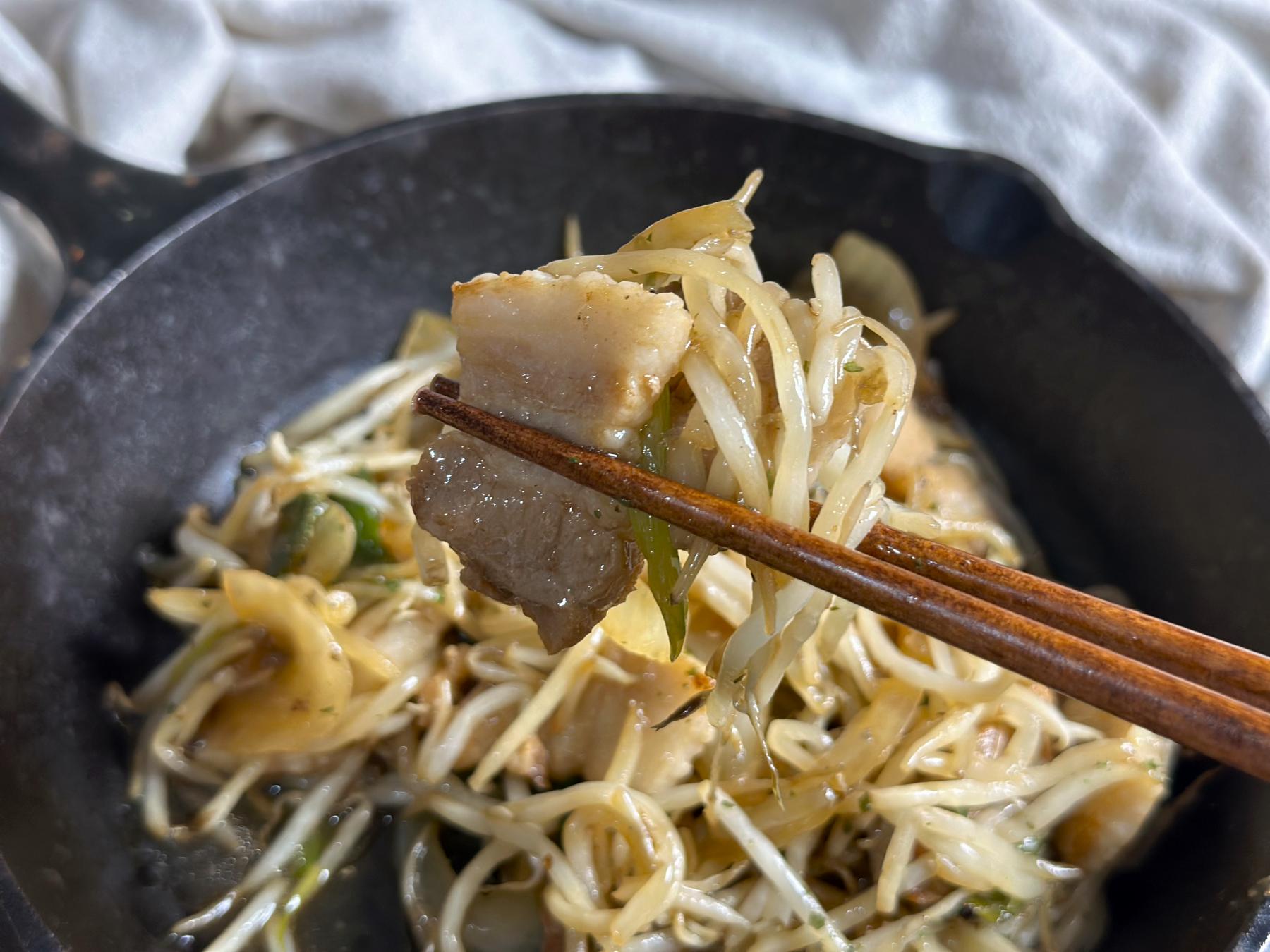 holding butanoyashi with chopsticks