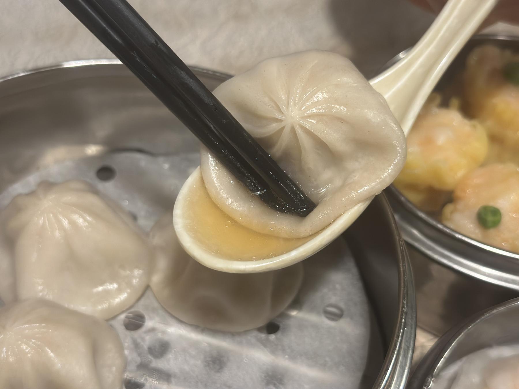 soup dumplings on the spoon
