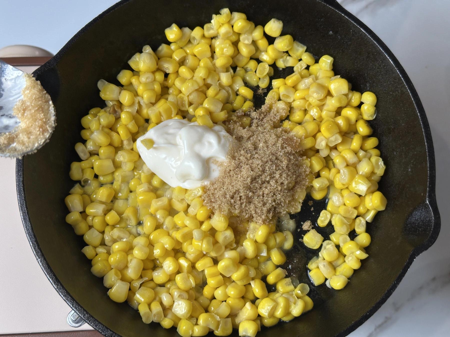 mayonaisse and sugar added on the corns