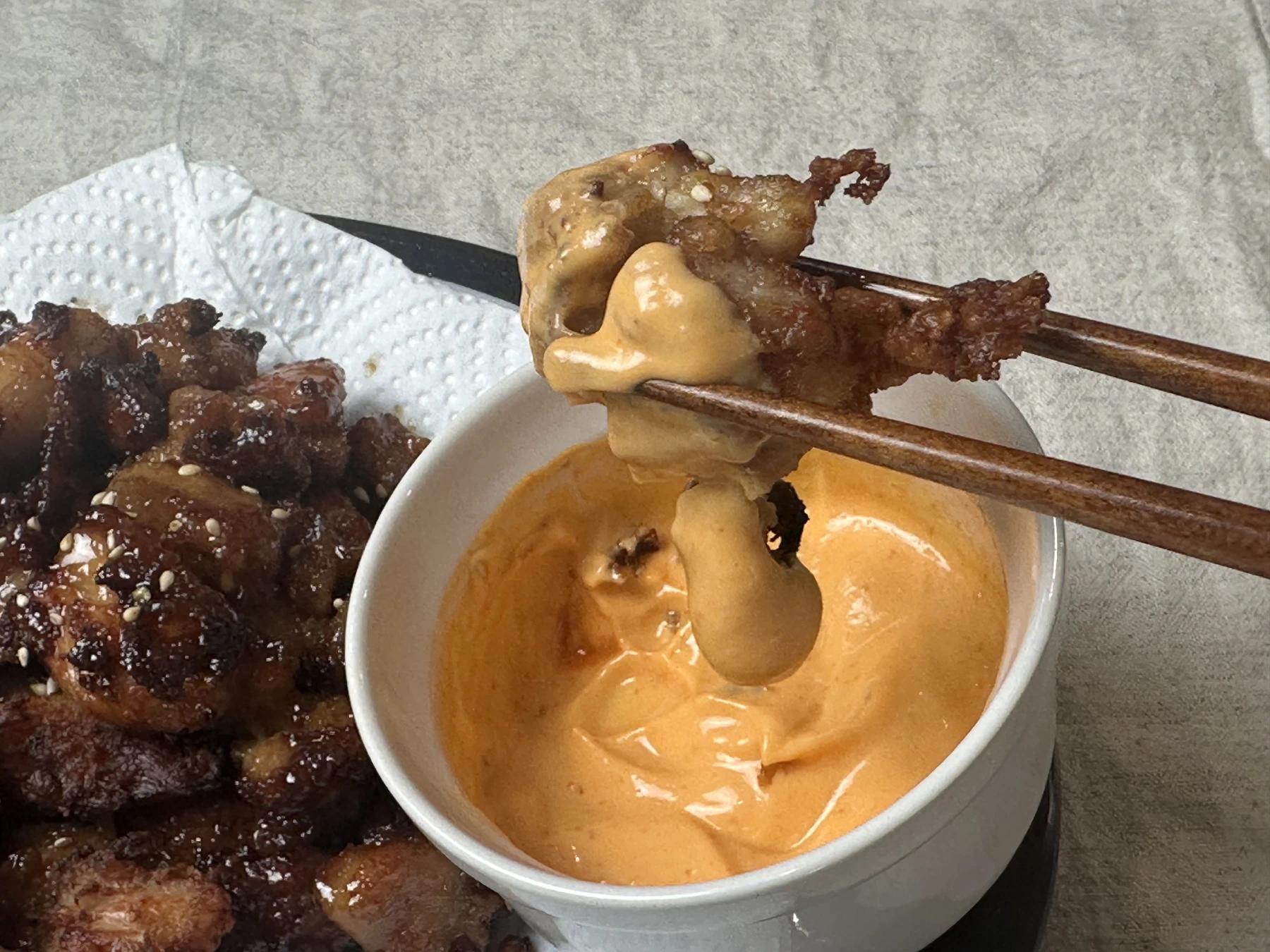 chicken karaage dipped in spicy mayo sauce