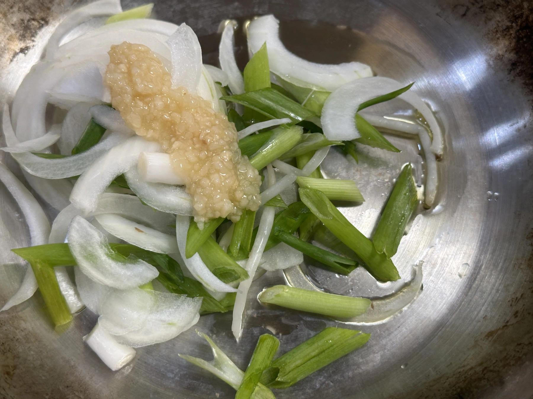 stir fry garlic, onion and green onion