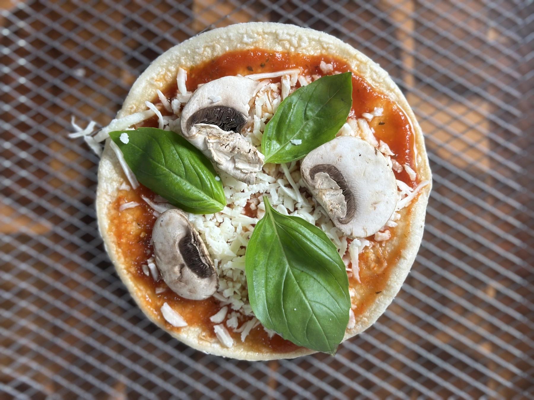 Add mushrooms and basil