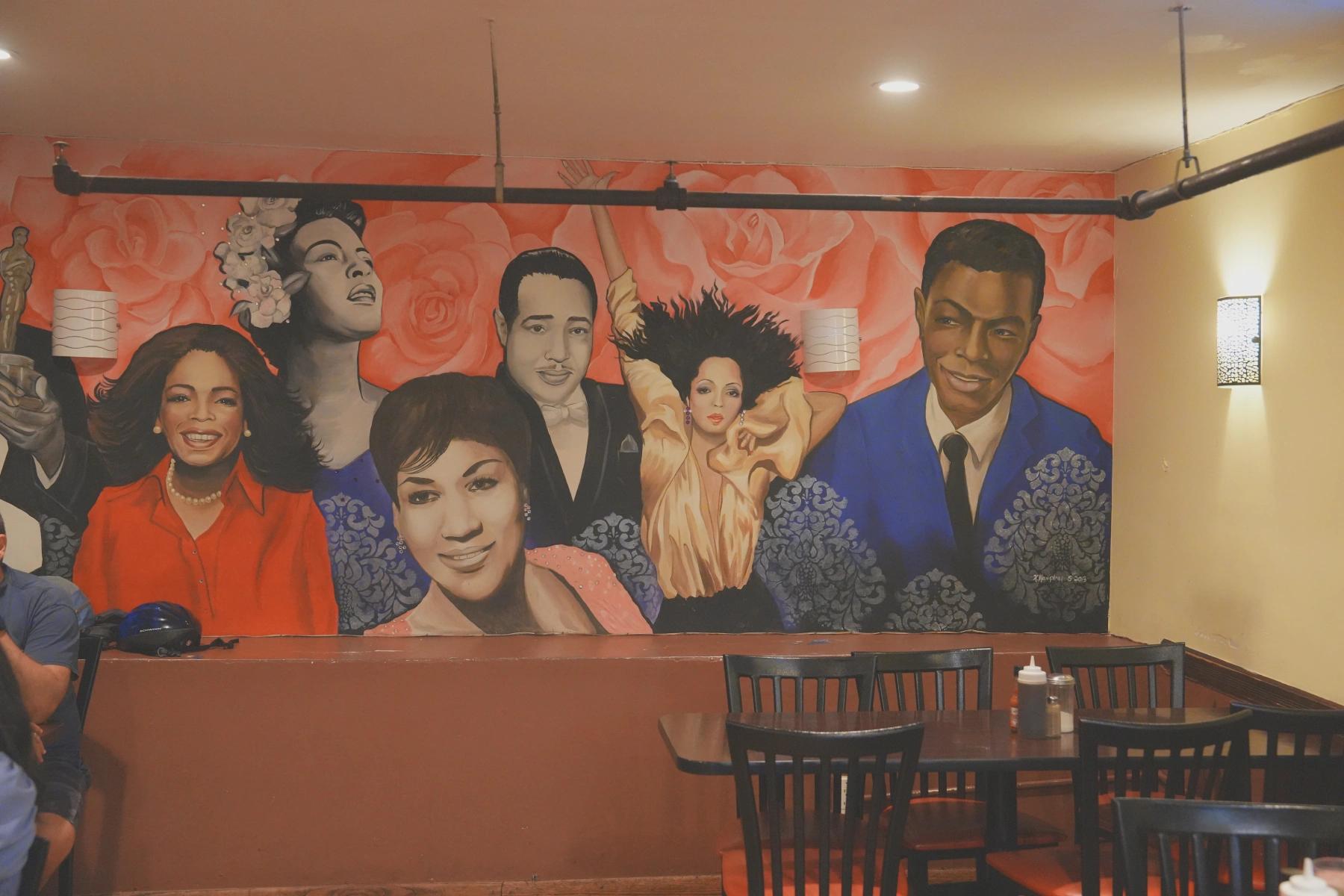 A wall with art at Amy Ruth's