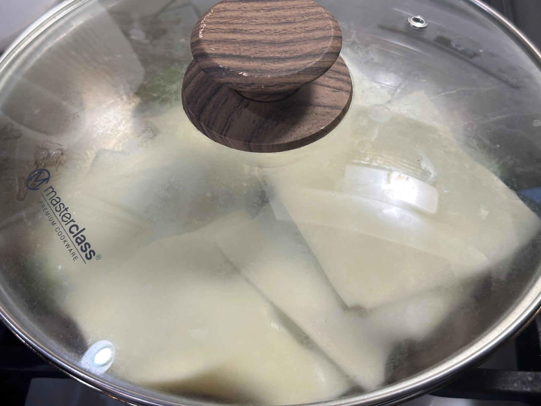 covering the pan with lid