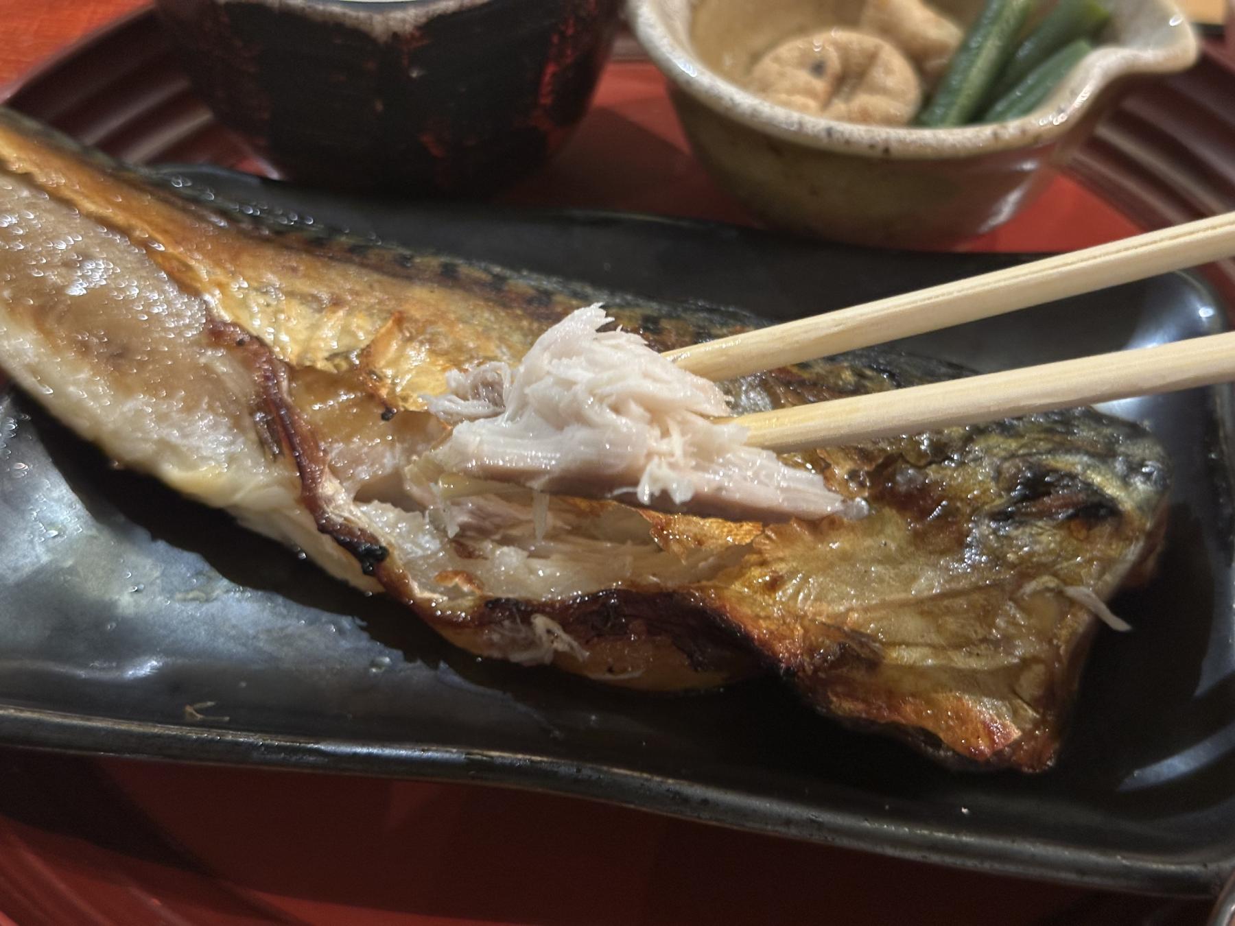 grilled mackerel on the chopsticks