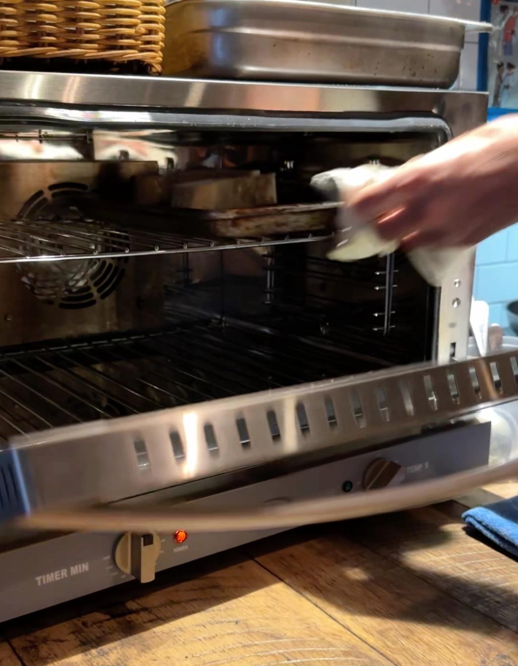 bread into oven