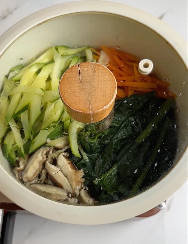 vegetables steaming in the pot
