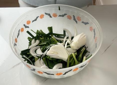 chives and onions in a bowl