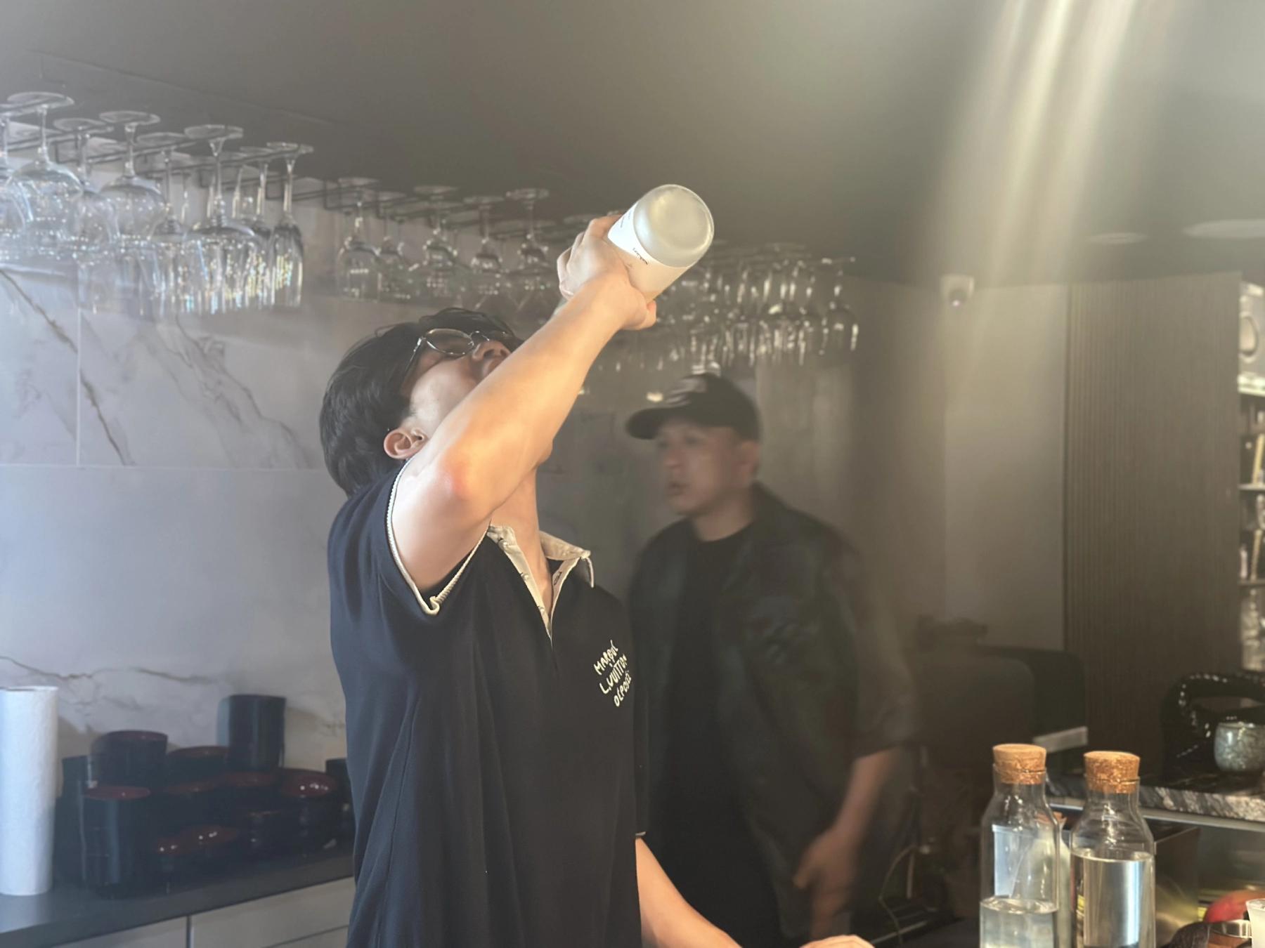 man drinking sake