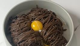 add egg yolk on the noodle