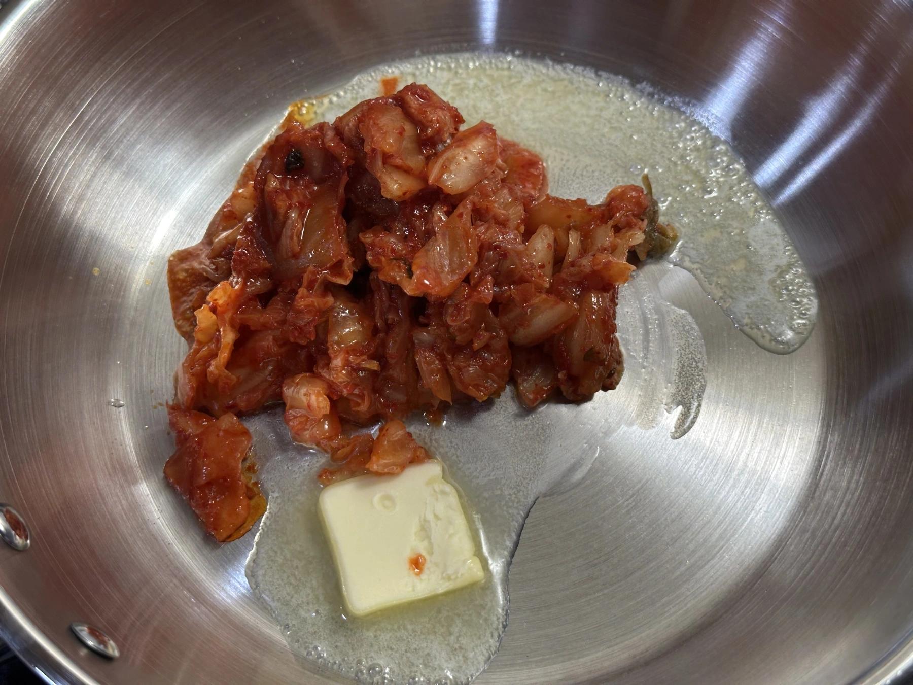 Kimchi and butter on the pan