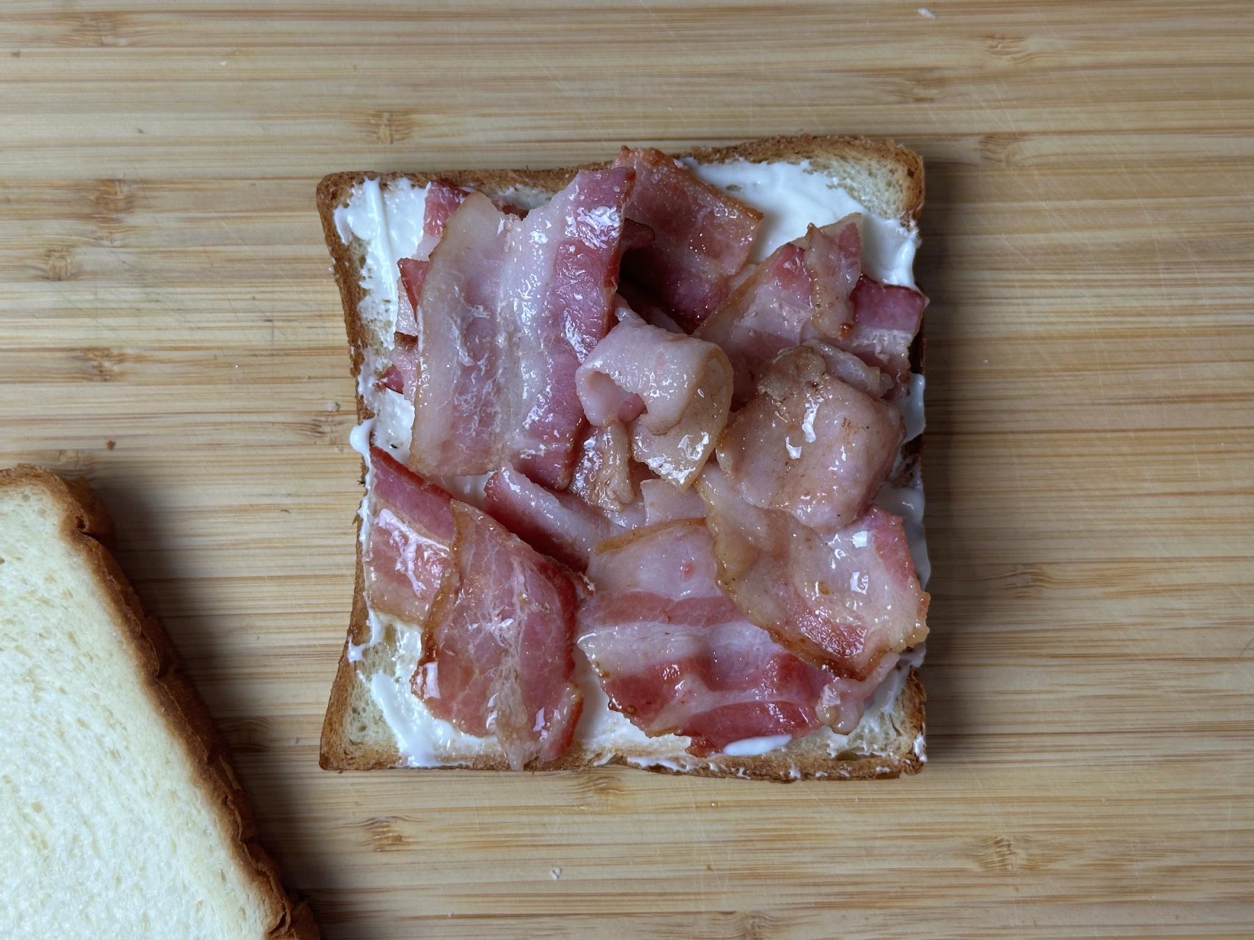 add bacons on the bread