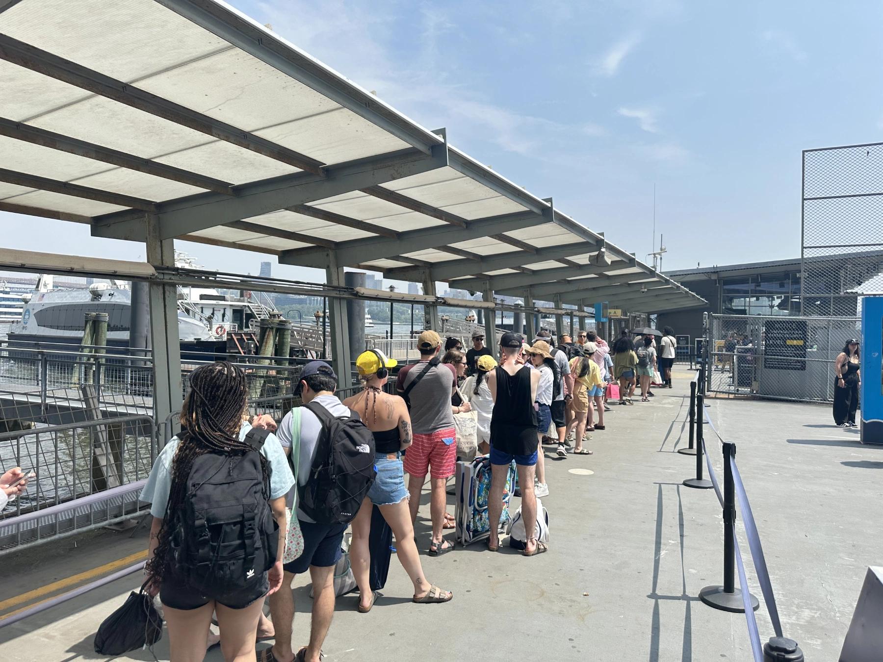 people standing ferry line