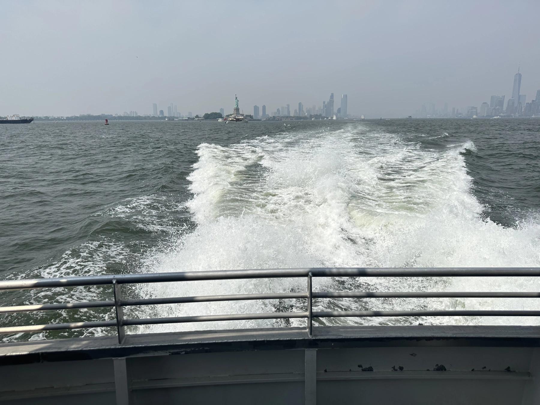 water wave and NYC seen behind it