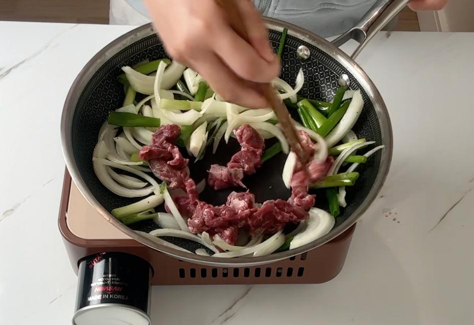 add beef into pan