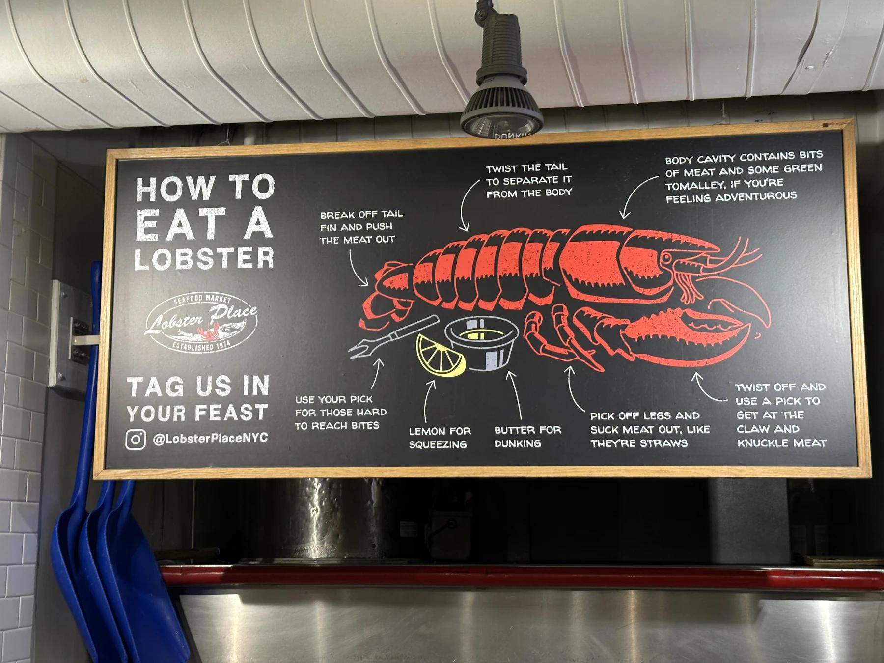 how to eat a lobster sign