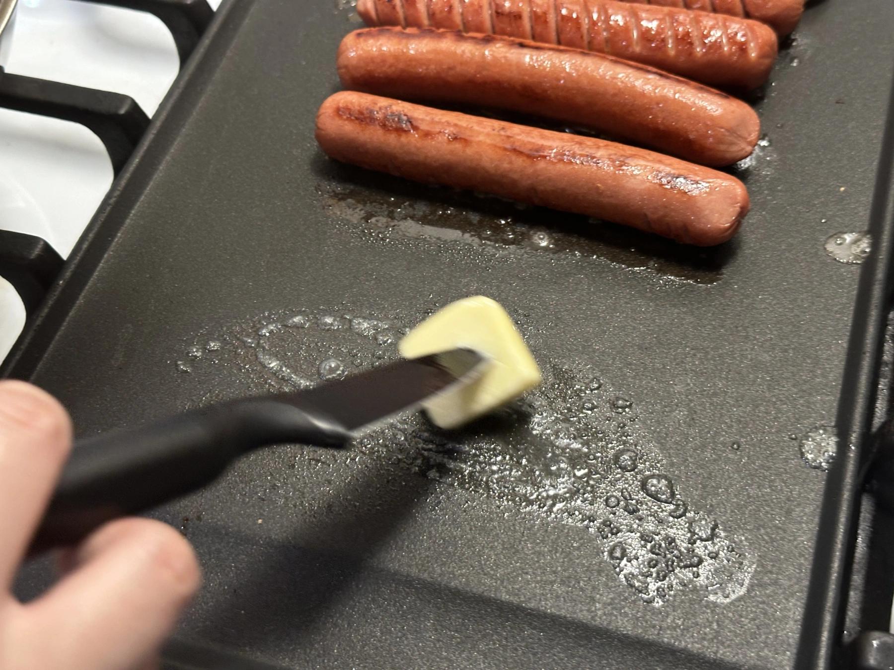spread butter on the grill