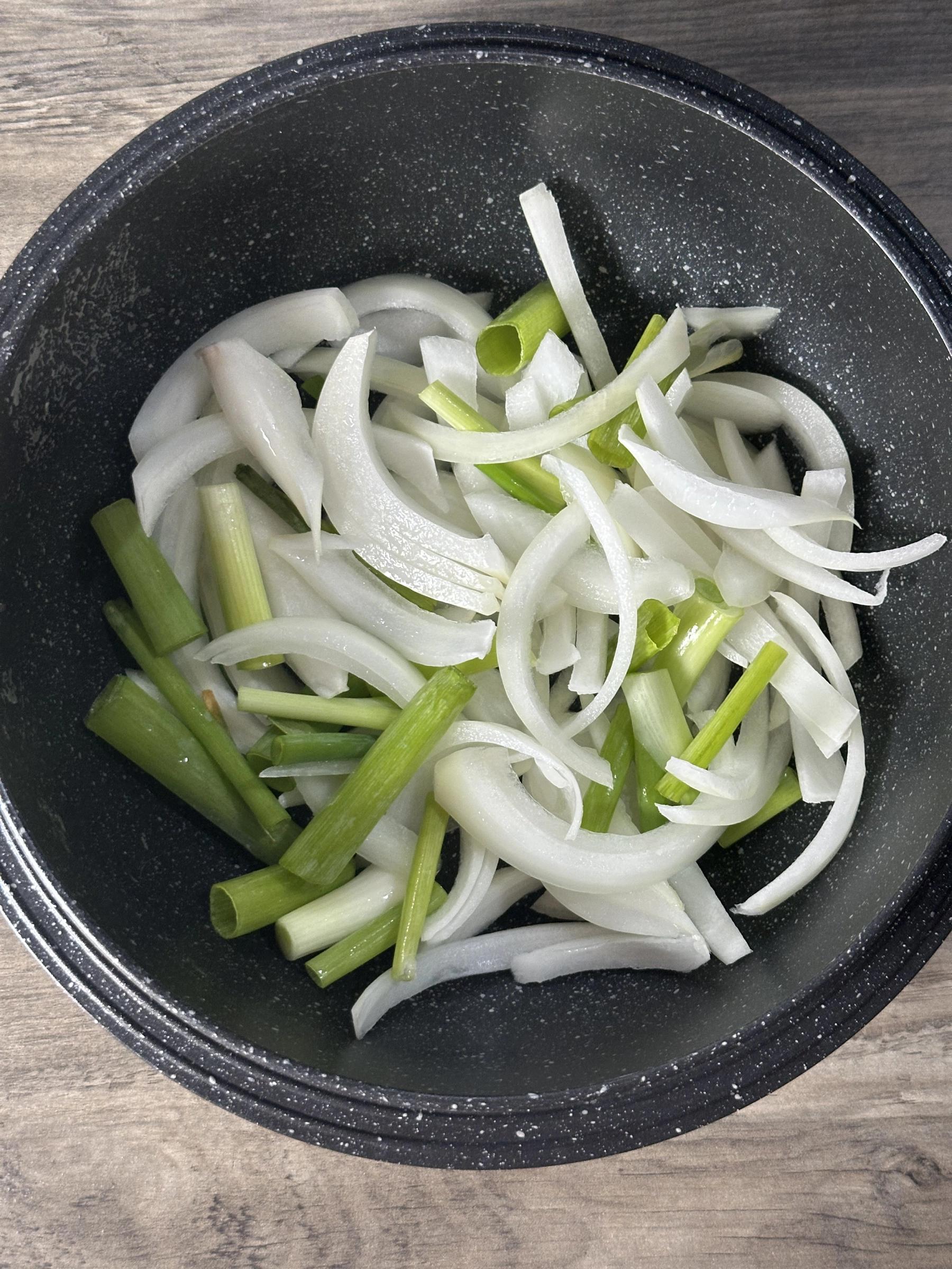 onion and green onion in the pot