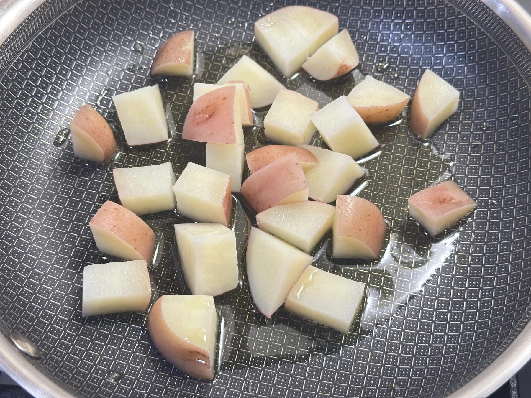 potatoes on the pan with oils