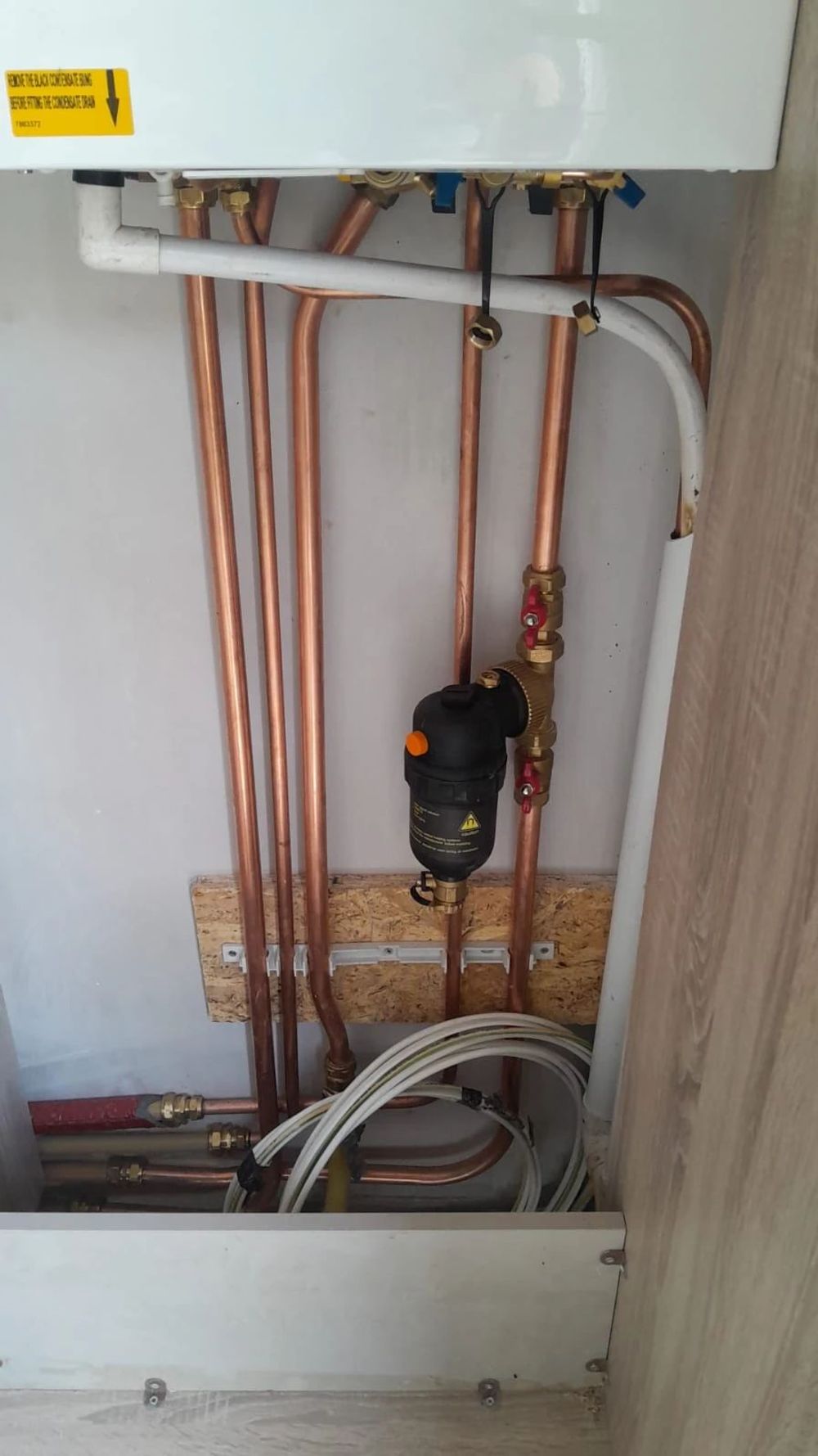 Boiler pipework with a magnetic system filter fitted