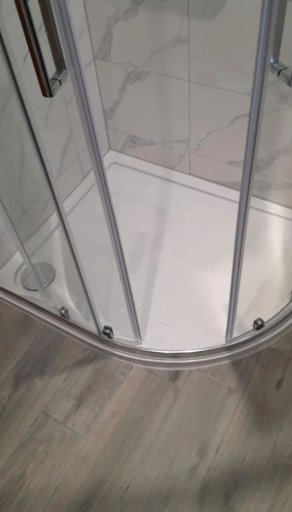 Quadrant shower tray with sliding glass door