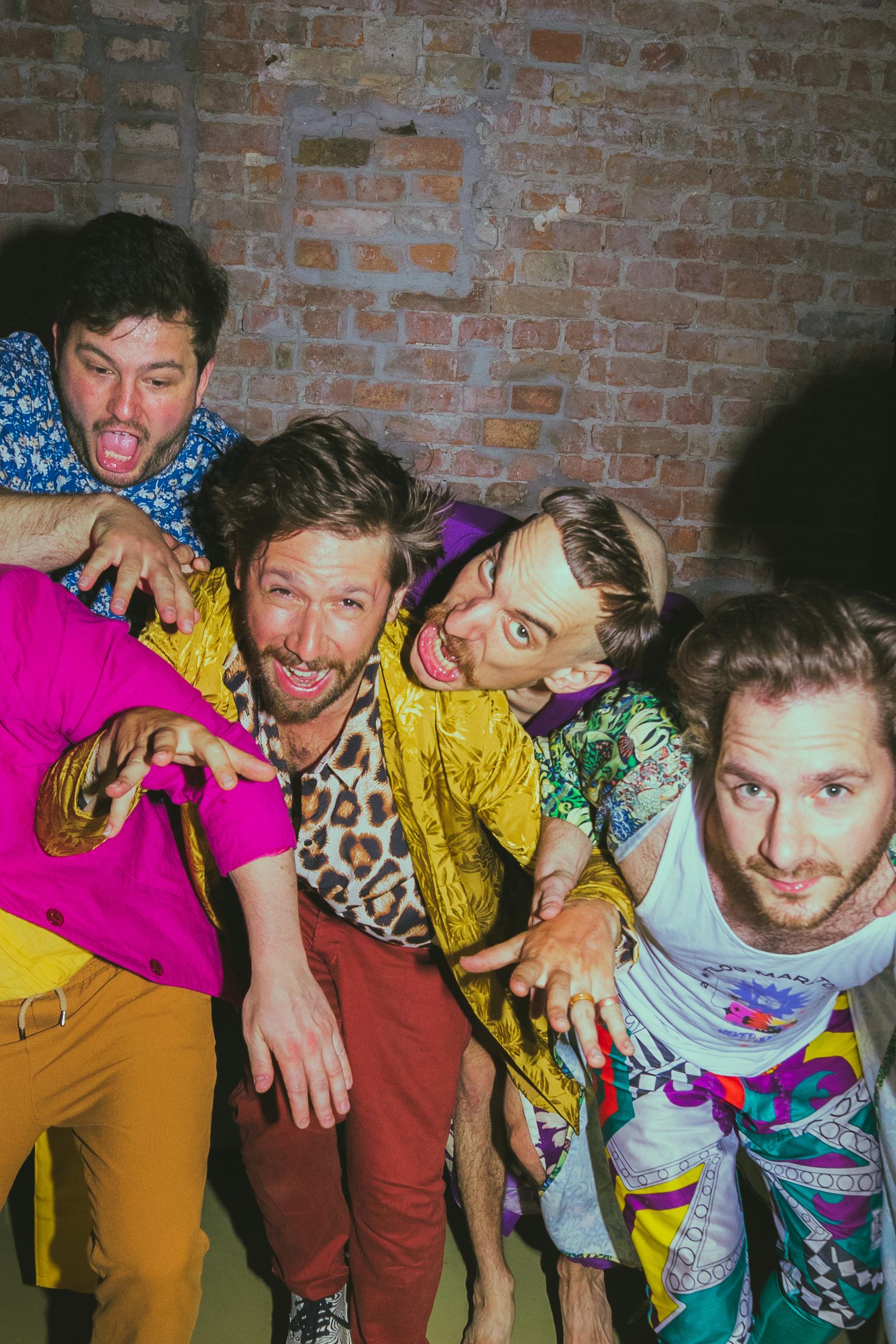 half naked violinist and singer on stage