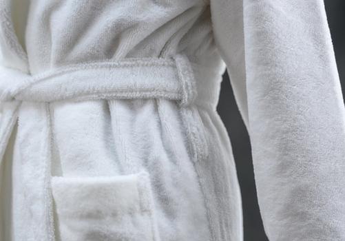 Detail of a bathrobe, featuring the dual loop and modesty tie