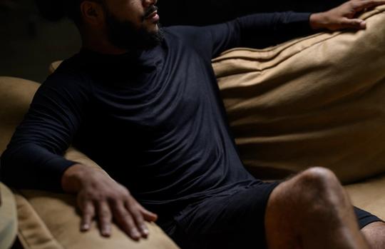 Man staying cool with Modal Pajamas in onyx