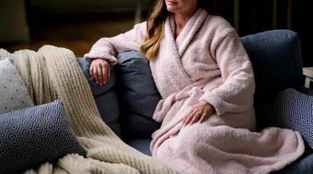 Woman wearing the cozy Ultra Plush Robe in blush