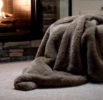 The luxurious and cozy Faux Fur Blanket in Truffle