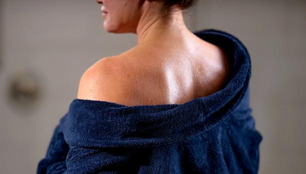 Harbor Resort Bathrobe on woman in bathroom
